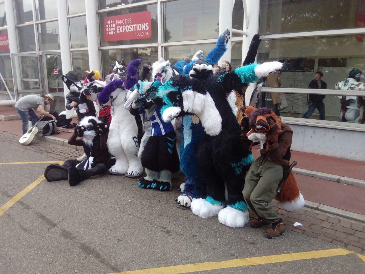 group picture with fursuit