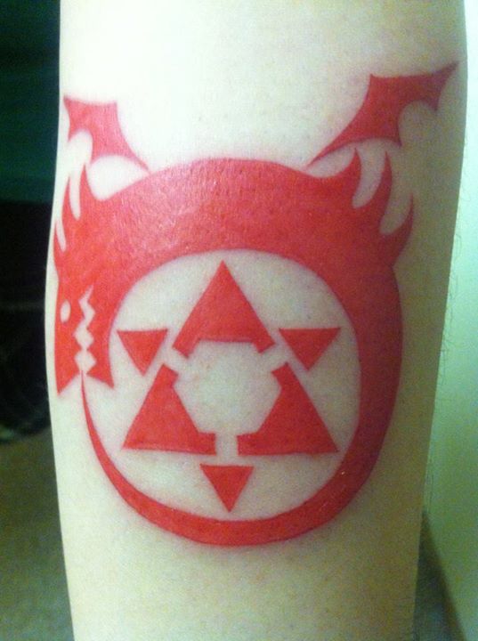 Fullmetal alchemist tattoo on the chest.