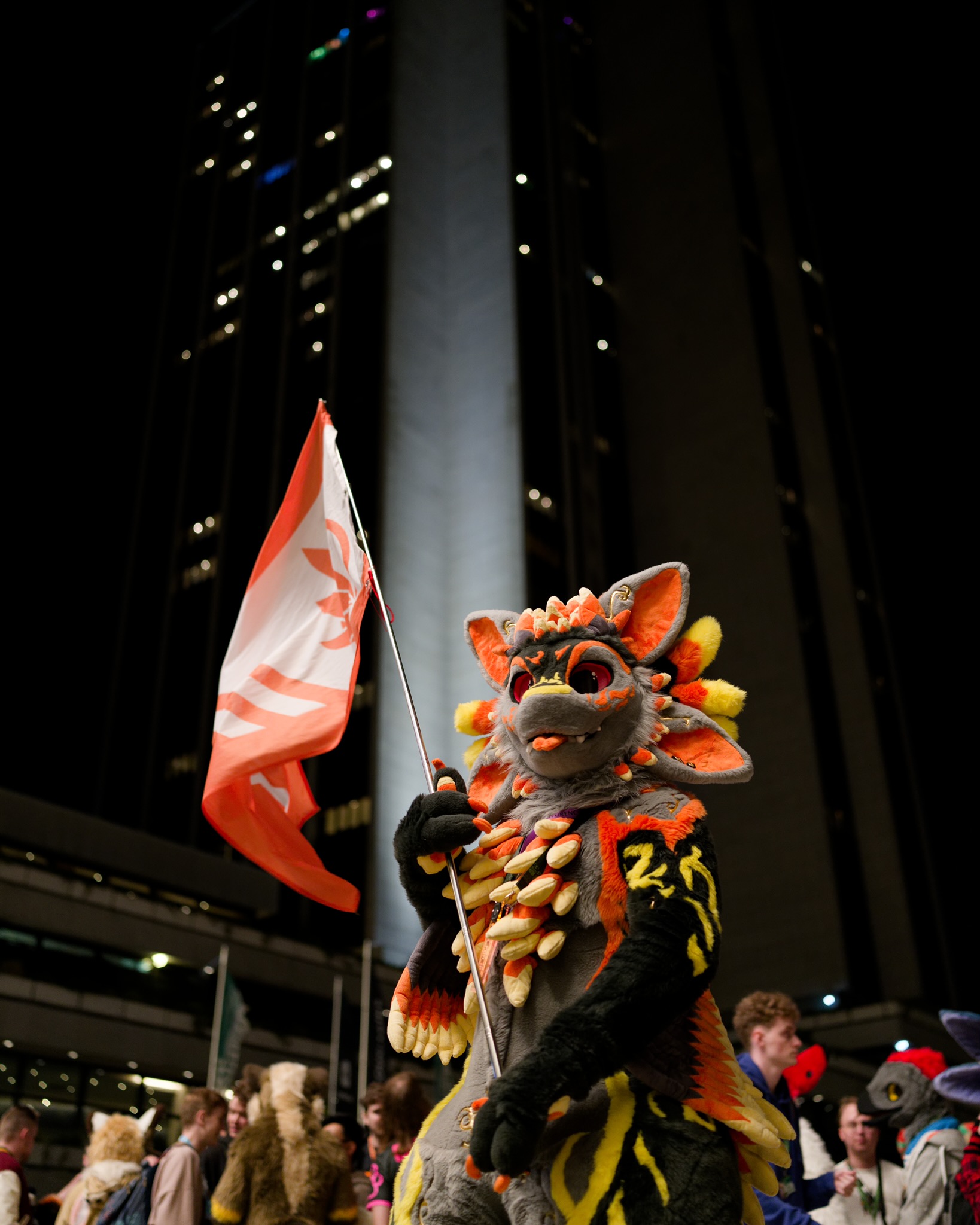 Me Holding an Avali flag at Eurofurence 28