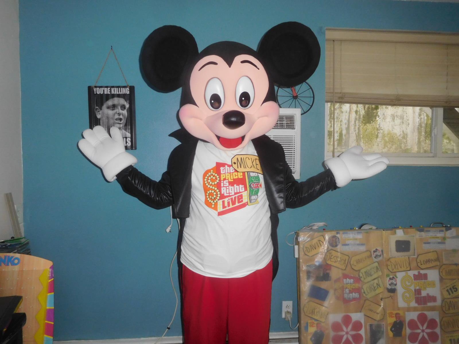 mickey mouse wearing a shirt