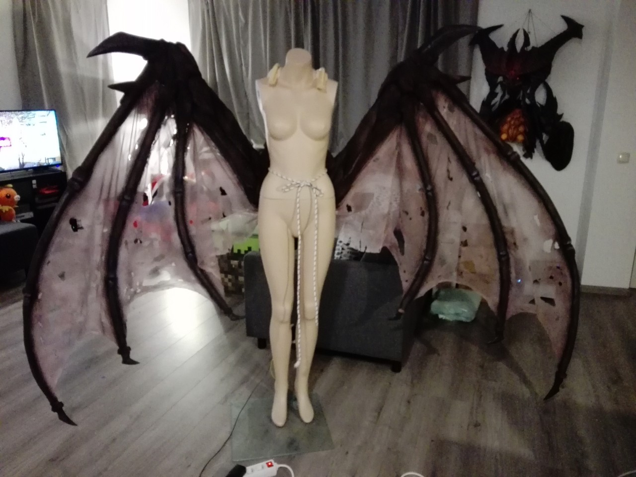 folded demon wings